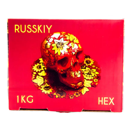 Horizontal view of Russkiy Hexagon Shisha Charcoal box, 1kg, red with hexagon pieces inside
